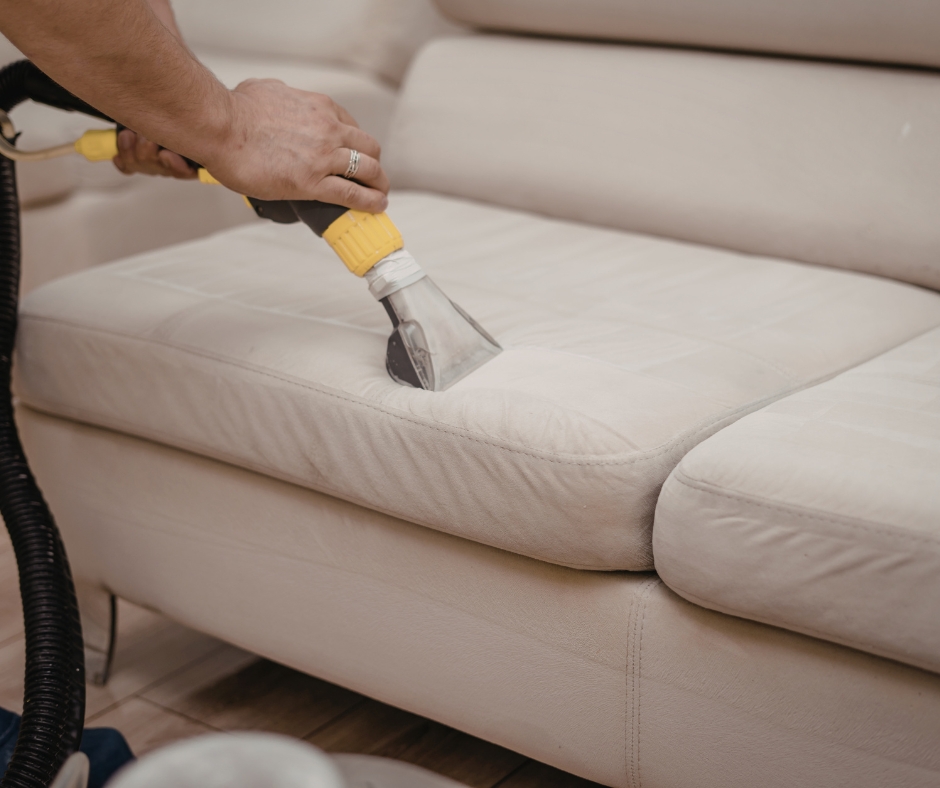 Professional sofa cleaning in progress using steam extraction equipment in Dublin
