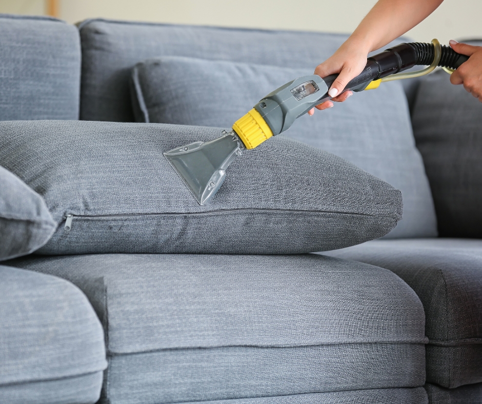 Upholstery steam cleaning service on gray fabric sofa in Dublin home